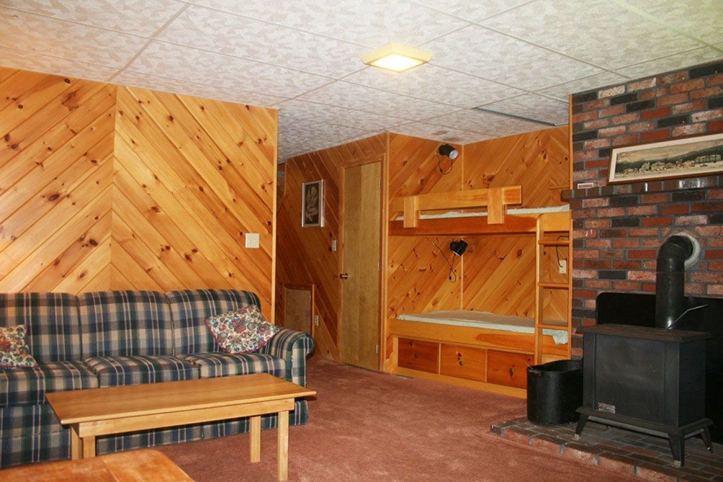 South Ridge H - Lower level with bunks and wood stove